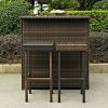 Summer-is-Coming-Add-This-3-Piece-Bar-Set-Made-of-Durable-Steel-Frame-and-Resin-Wicker-in-Brown-Finish-This-Set-Includes-1-Bar-with-Slef-and-2-Stools-0-1